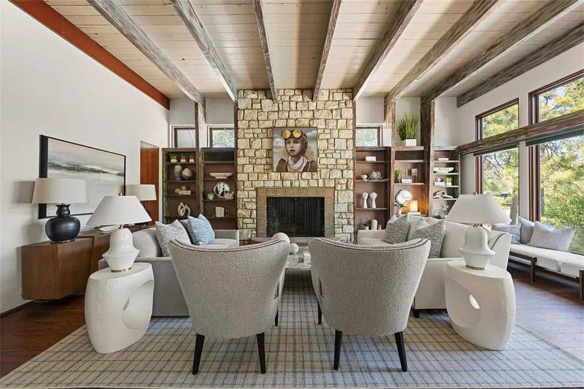 Great room with beamed ceiling and stone fireplace